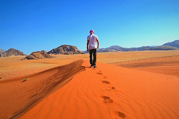 Enjoy the red sands dune area